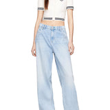 Polo crop Slim fit a coste con logo script ricamato crema