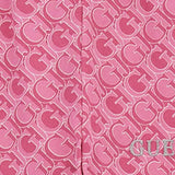 Pantalone jogger con pattern monogram allover rosa
