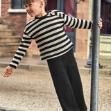 Completo due pezzi maglia e pantalone nero