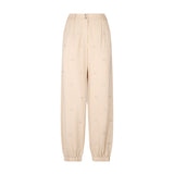 Pantalone con lettering all-over in strass beige