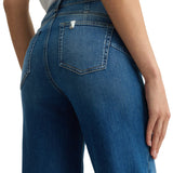 Jeans bottom up con piega stirata denim medio