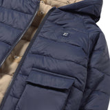 Piumino neonato imbottito reversibile con cappuccio blu