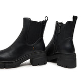 Tronchetto con elastico e suola track in ecopelle nero