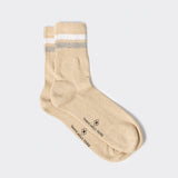 Calza lunga a coste con profili a contrasto Beige