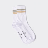 Calza lunga a coste con profili a contrasto  bianca