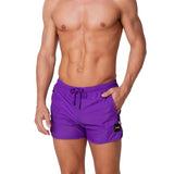 Short mare con zip laterali viola