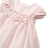 Chiffon ceremony dress with pink baby diaper cover