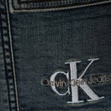 Jeans jogger con tasconi in denim scuro
