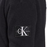 Cardigan in maglia con zip e patch del logo nero