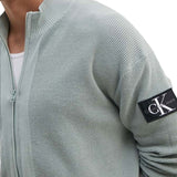 Cardigan in maglia con zip e patch del logo grigio