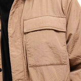 Giubbino con due tasconi e zip Crinkle beige