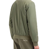 Giubbino con zip e logo sul petto verde
