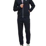 Tuta con zip e placca logo nero