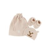 Set nascita cappellino e scarpine crema