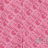 Pantalone jogger con pattern monogram allover rosa