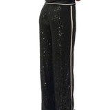 Pantalone stile jogger con paillettes e fascia a contrasto nero