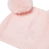 Cappello in maglia con pon pon rosa