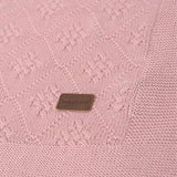 Copertina in maglia di cotone rosa