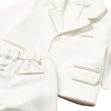 Abito con giacca a due bottoni e profili avorio