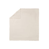 Copertina in maglia con pellicciotto interno panna