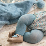 Copertina peluche pompon azzurro