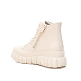 Sneakers con suola bold e cerniera beige