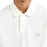 Polo con logo etichetta sul petto bianco