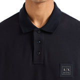 Polo con logo etichetta sul petto blu