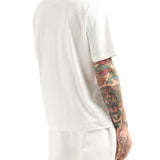 T-shirt con logo ricamato sul petto bianco