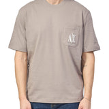 T-shirt con tasca sul petto e logo ricamato beige