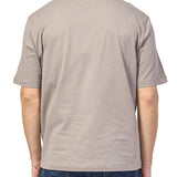 T-shirt con tasca sul petto e logo ricamato beige