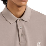Polo con logo ricamato sul petto beige