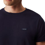 T-shirt slim in cotone stretch con targhetta logo blu