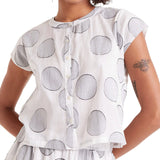 Blusa con macropois bianco