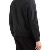Giubbino con zip e logo a contrasto in nylon nero/oro
