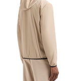 Giubbino chiusura zip e cappuccio in nylon beige