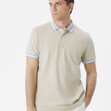 Polo con dettagli a contrasto sabbia