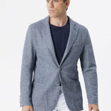 Giacca destrutturata in cotone-lino con chiusura a tre bottoni e taglio vivo blu