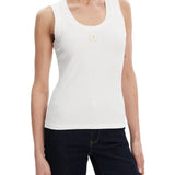 Top a costine con logo patch bianco