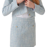 Minigonna in tweed celeste