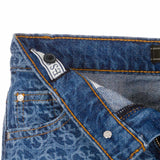Gonna jeans con logo allover in denim medio