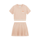 Completo 2 pz maglia e gonna a trecce rosa