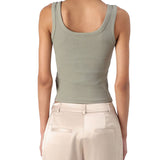 Top a costine con logo triangolo strass verde