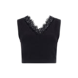 Top a coste con pizzo nero