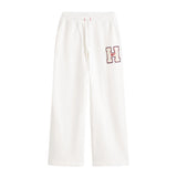 Pantalone joggers con applique logo bianco antico