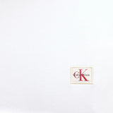 Felpa Calvin Klein in cotone logo badge bianco