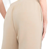 Pantaloni jogging in scuba con banda strass champagne
