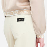 Felpa con zip e banda logo sul fondo champagne