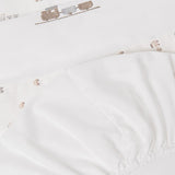 Cappello neonato in maglia celeste