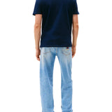 T-shirt maniche corte con badge frontale blu